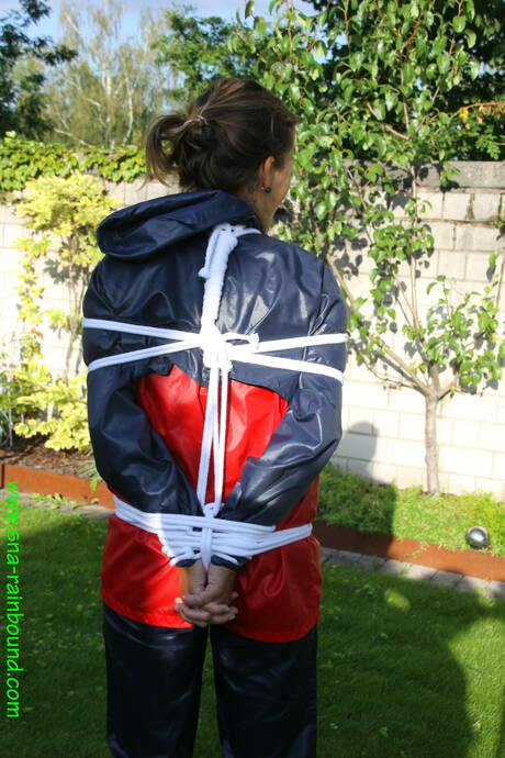 Shiny Nylon Arts Rain Bound invites you to browse their xxx photos with randy teen in bizarre bdsm action